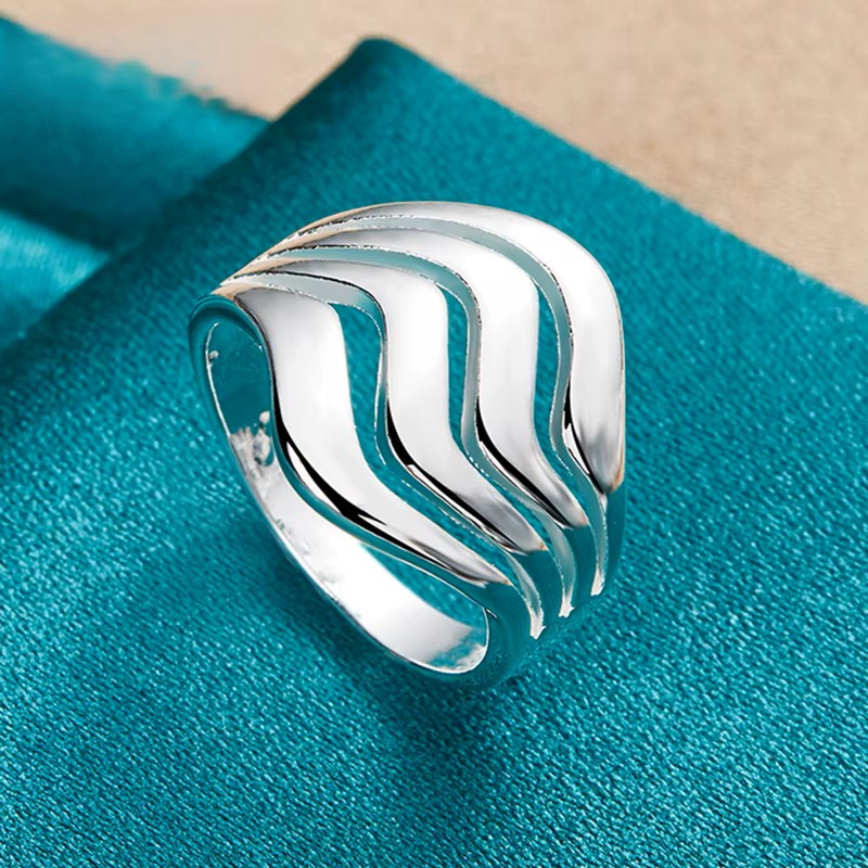 A delicate silver ring featuring a minimalist design, perfect for everyday elegance